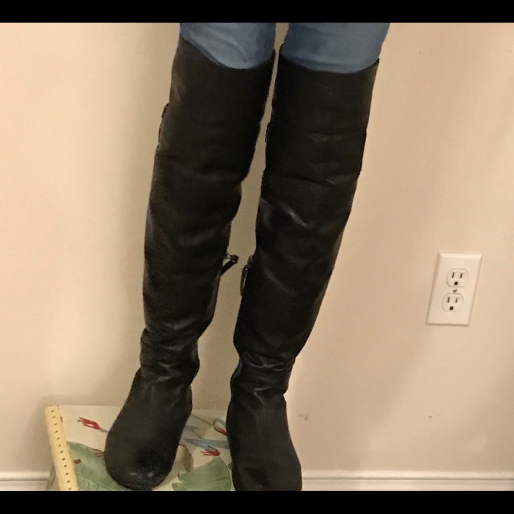 COPY - Thigh high leather boots.